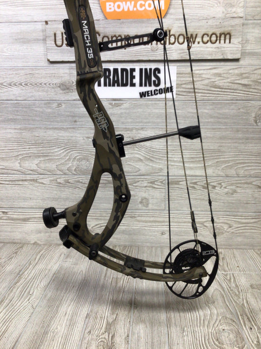 PSE Mach 35 right hand mossy oak bottomlands 60-70# 27-32.5"