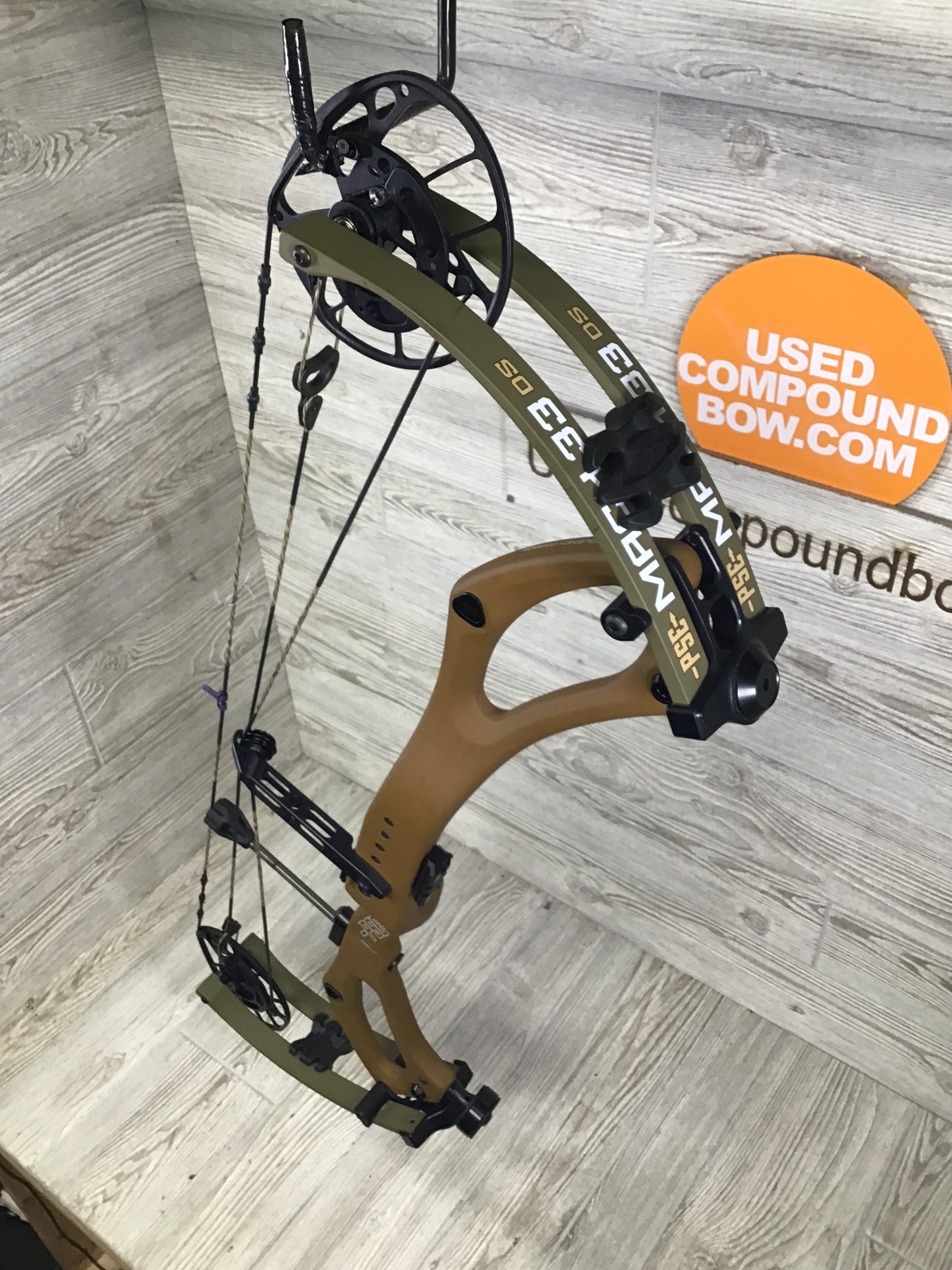 Used PSE Mach 33 DS 25.5-31" 60-70lb Right Hand Tan & Green
