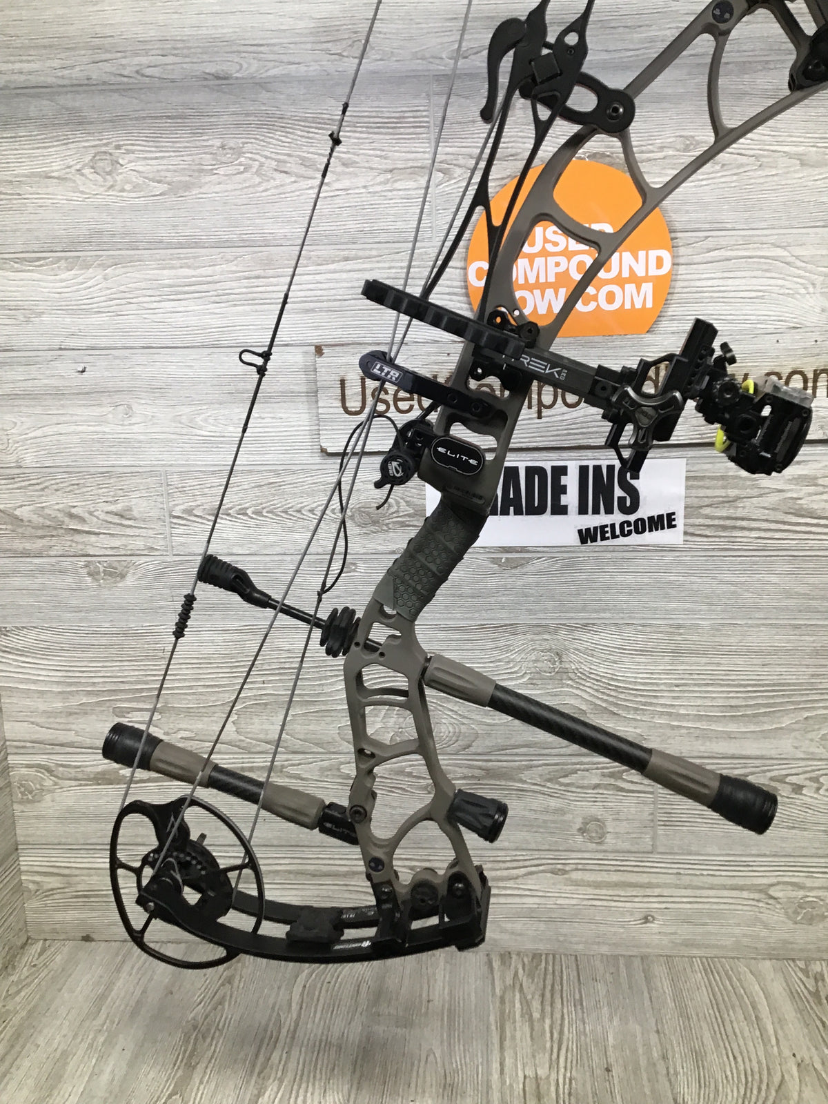 Used Elite Omnia Right Hand 70lb sienna brown package