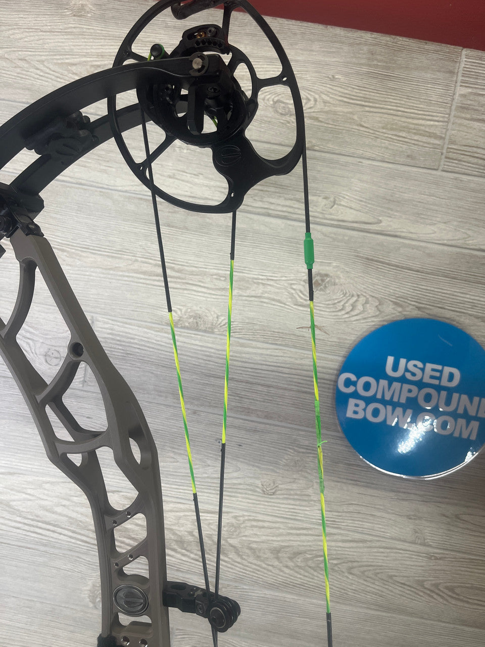 used Elite Omnia Right Hand 65lb sienna brown