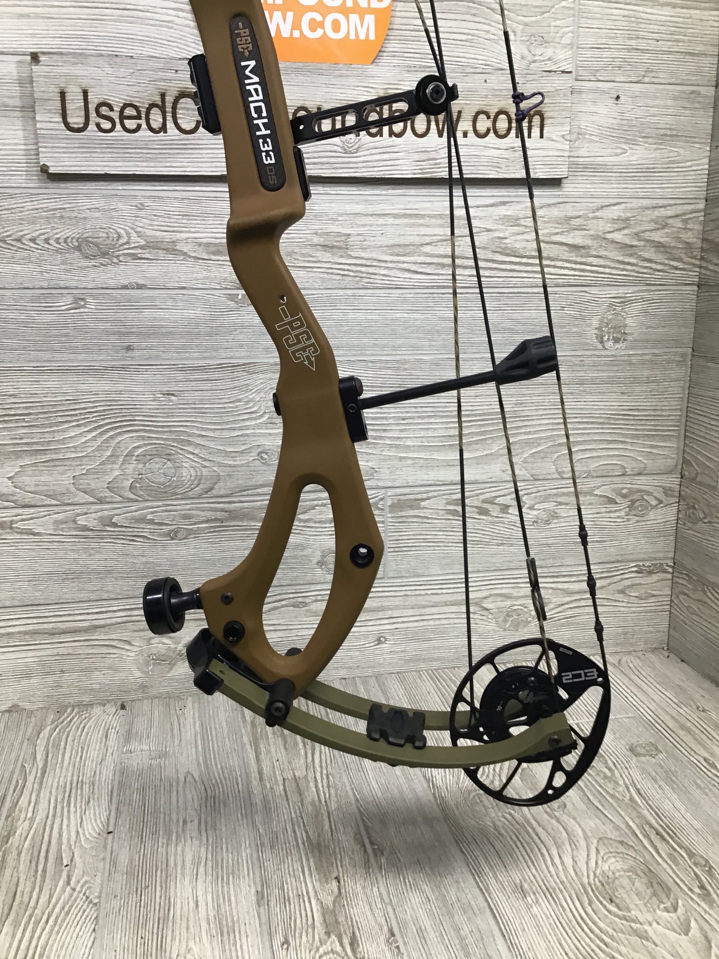 Used PSE Mach 33 DS 25.5-31" 60-70lb Right Hand Tan & Green
