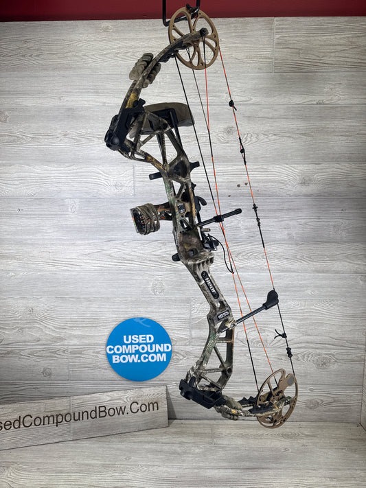 Used Bear Paradox 55-70# RH Real Tree Package