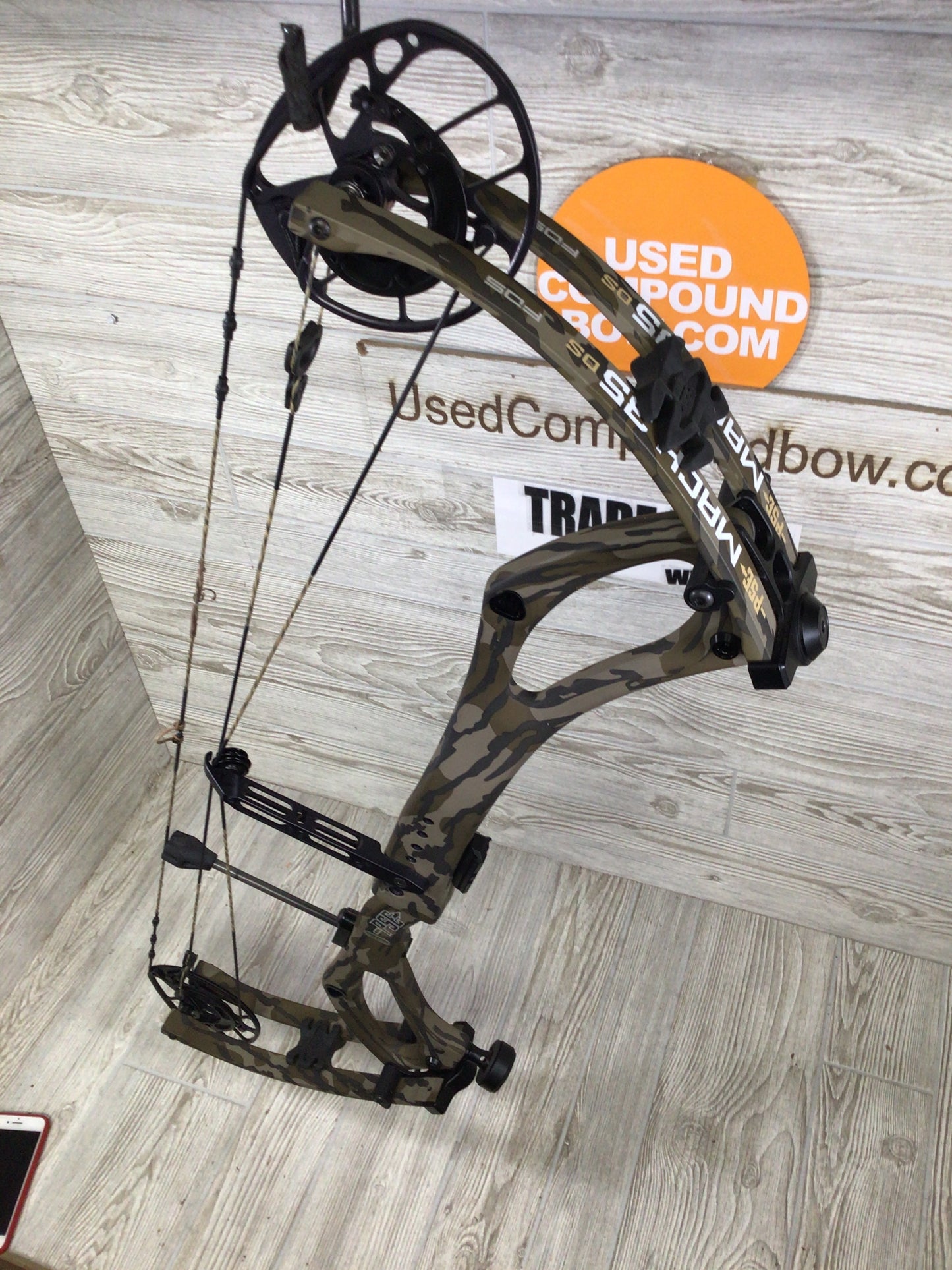 PSE Mach 35 right hand mossy oak bottomlands 60-70# 27-32.5"