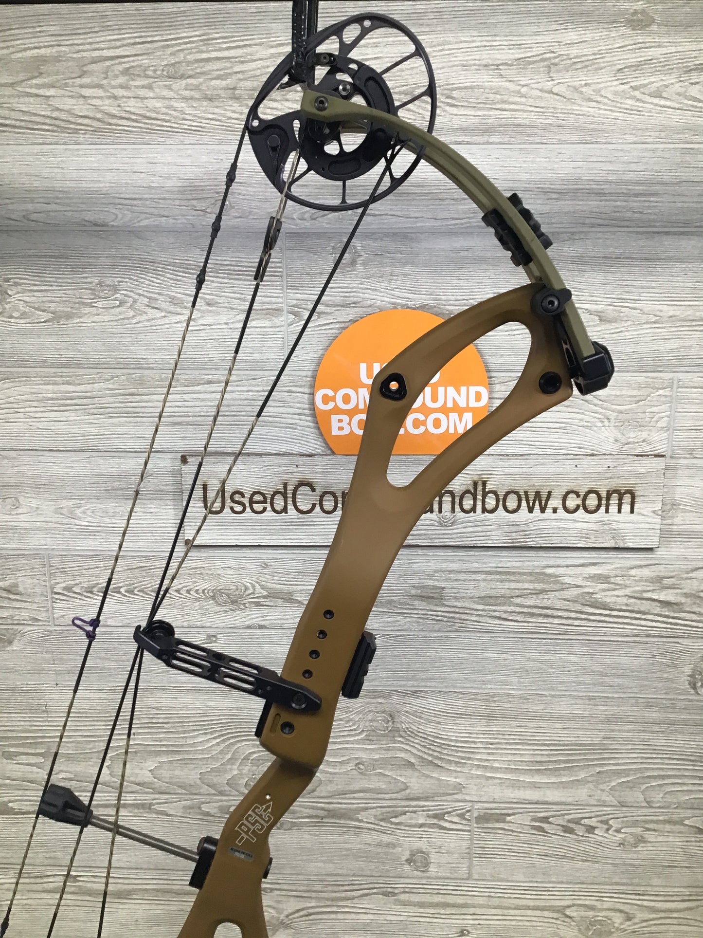 Used PSE Mach 33 DS 25.5-31" 60-70lb Right Hand Tan & Green