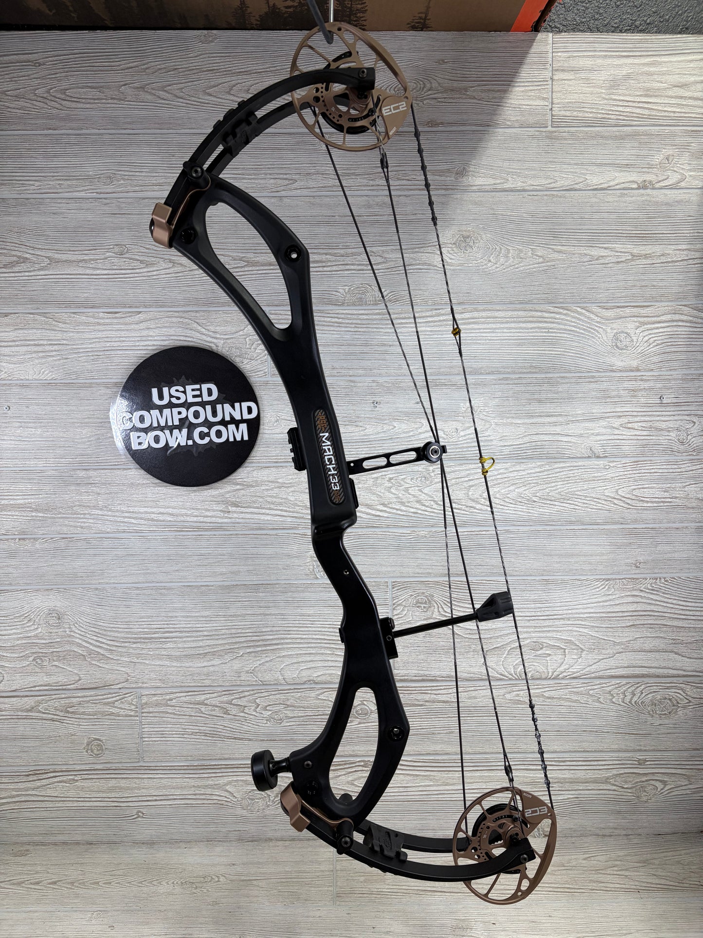 Used PSE Mach 33 DS 25.5-31" 70-80lb Right Hand Black/Bronze with Gas System X Strings