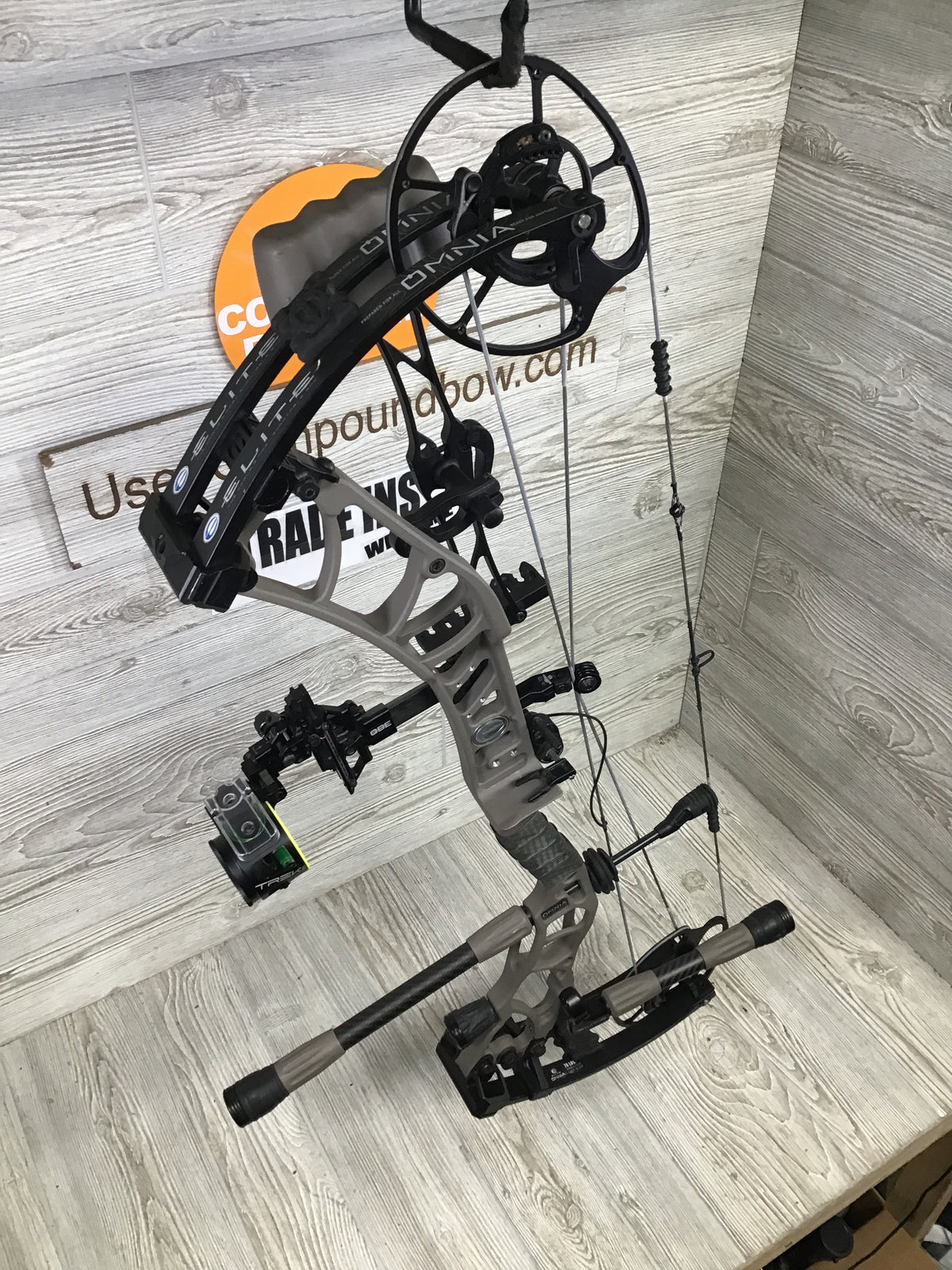 Used Elite Omnia Right Hand 70lb sienna brown package