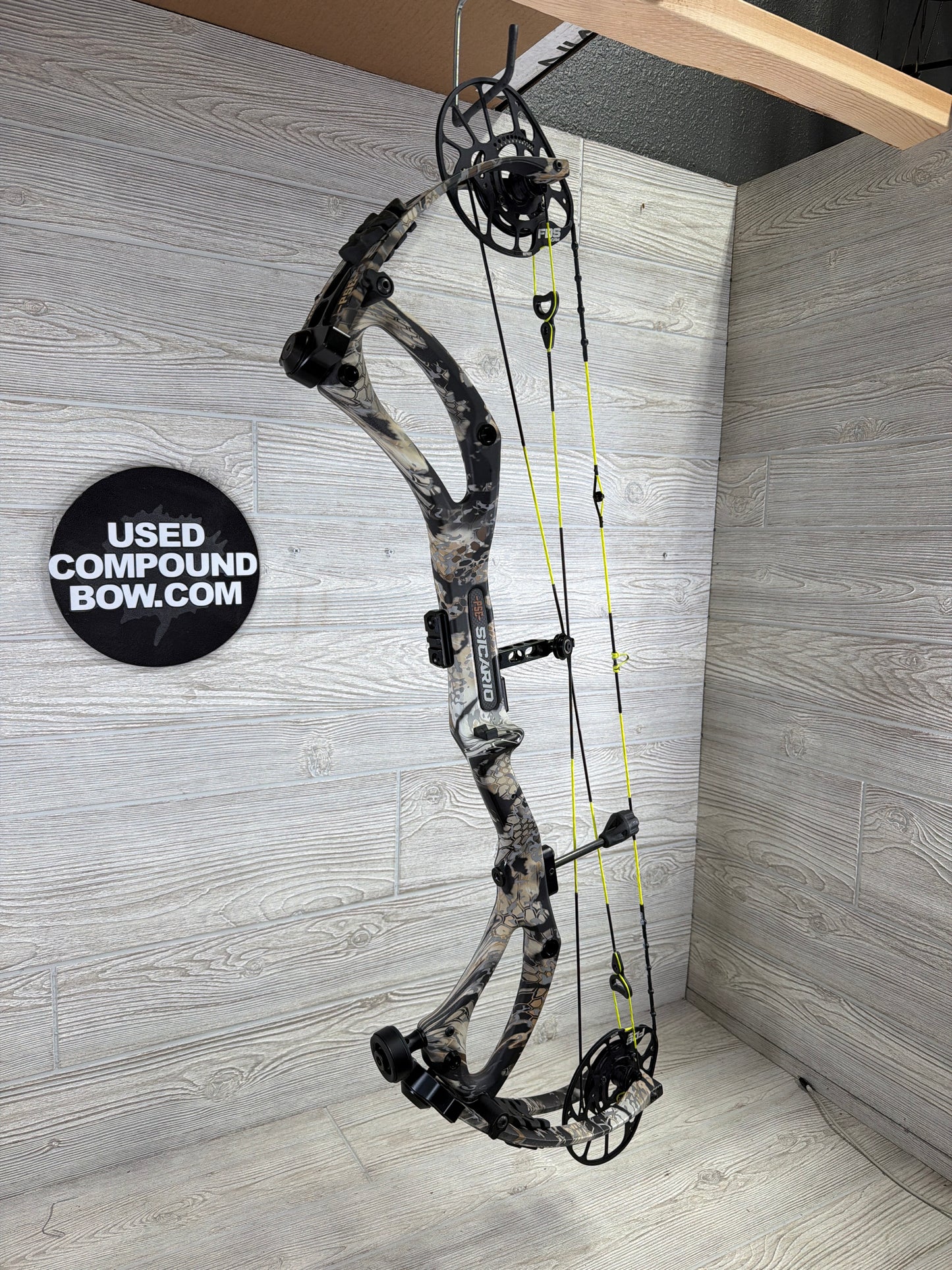 Used PSE Sicario FDS Kryptek Camo Right Handed with custom strings 80#