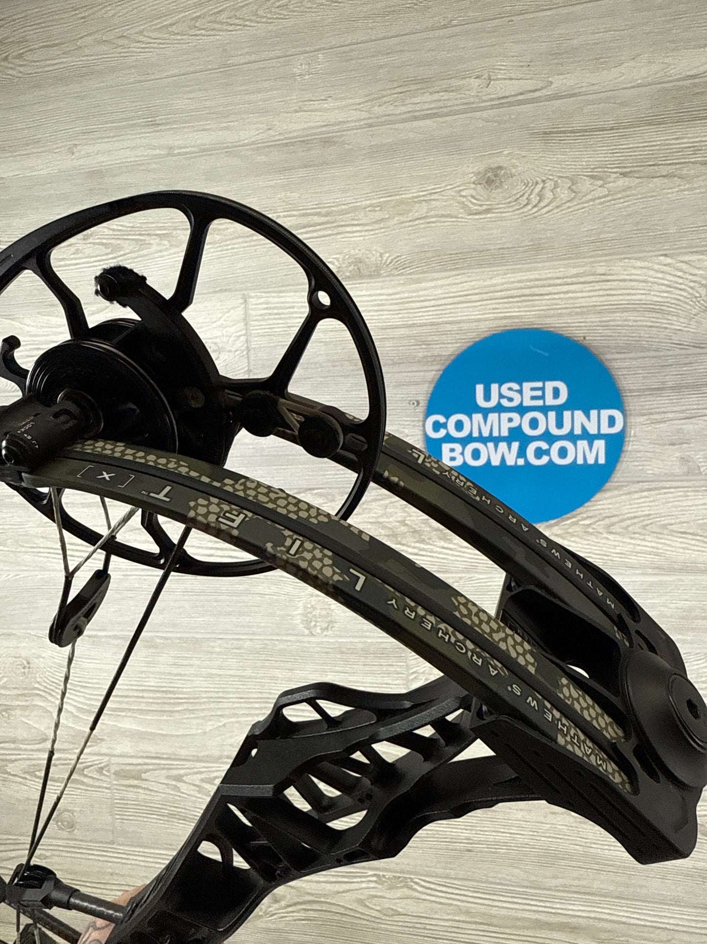 Used Mathews LIFT X 29.5 Black Riser with KUIU Limbs RH Bow