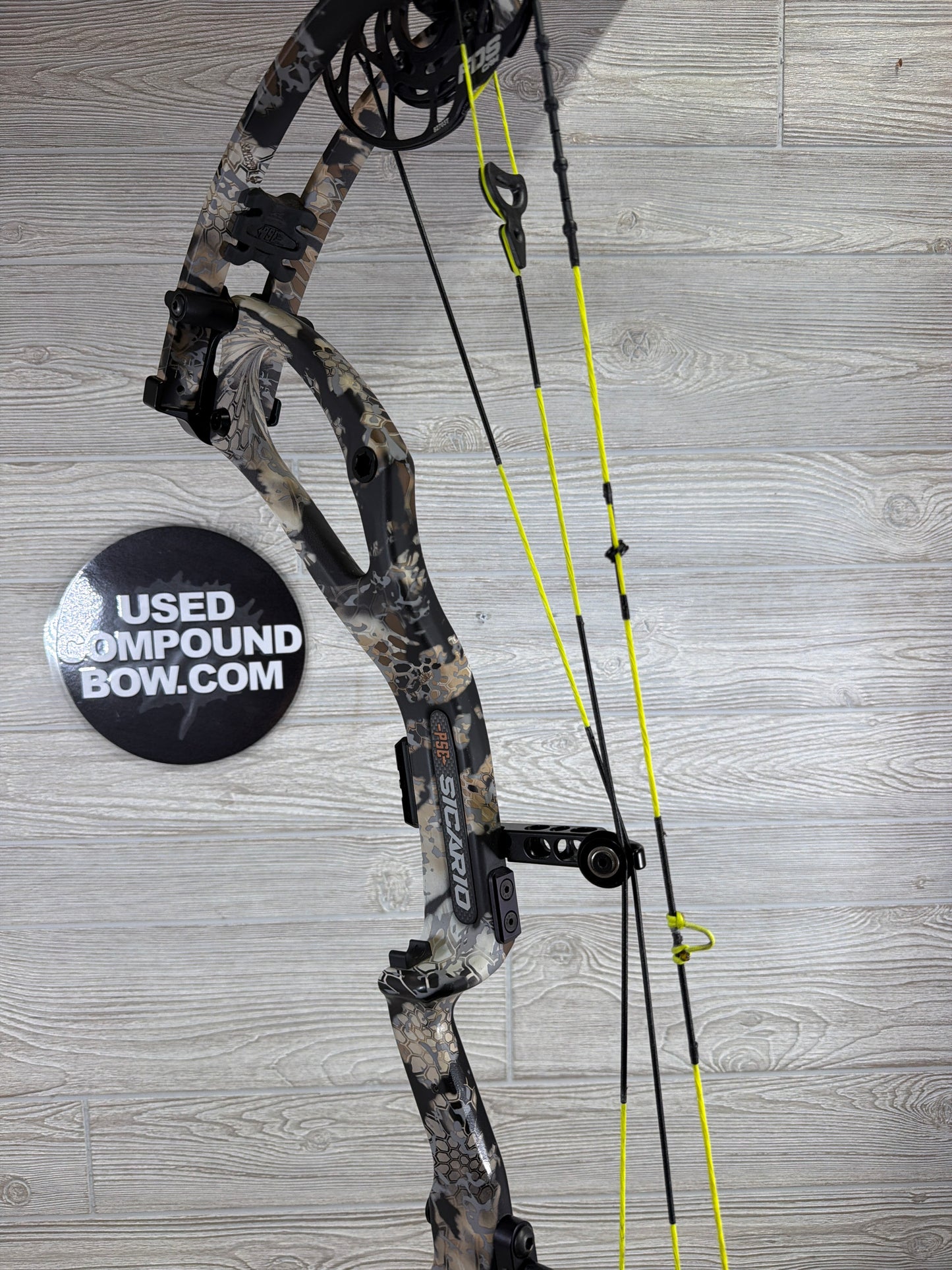 Used PSE Sicario FDS Kryptek Camo Right Handed with custom strings 80#