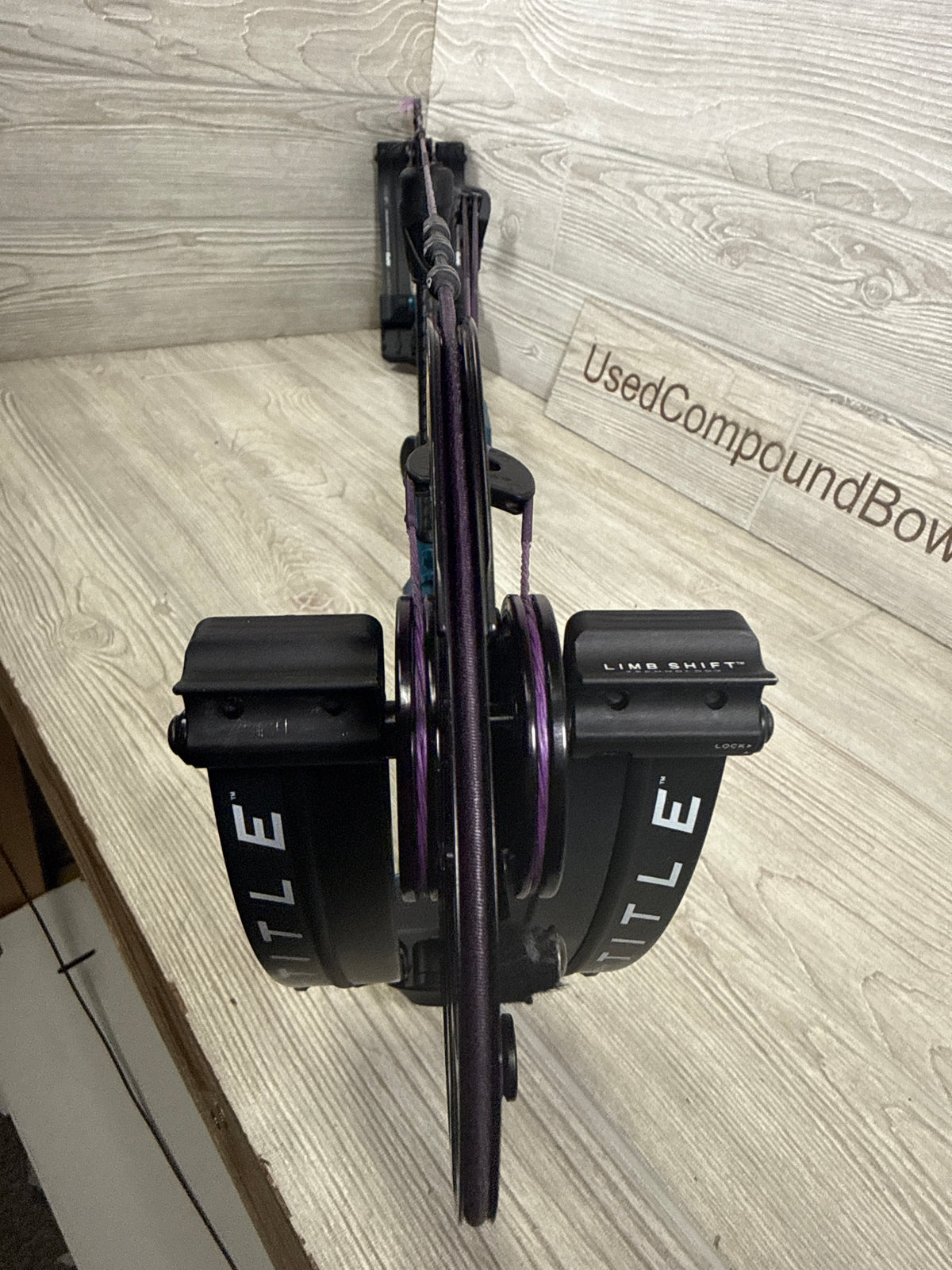 Used Mathews Title 38 (Gen 2) Teal Black Limbs custom purple strings RH