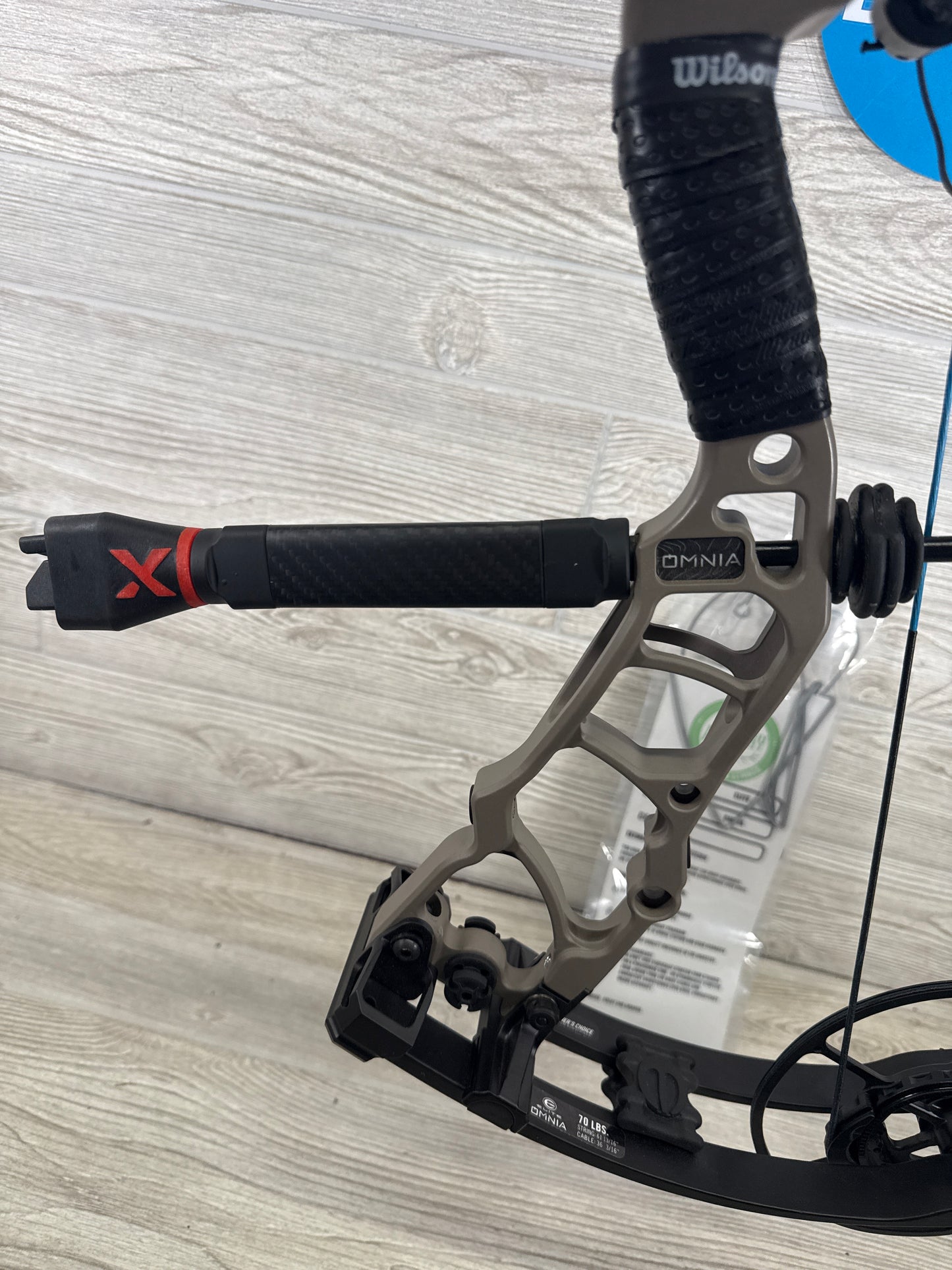 Used Elite Omnia Right Hand 70lb sienna, brown package