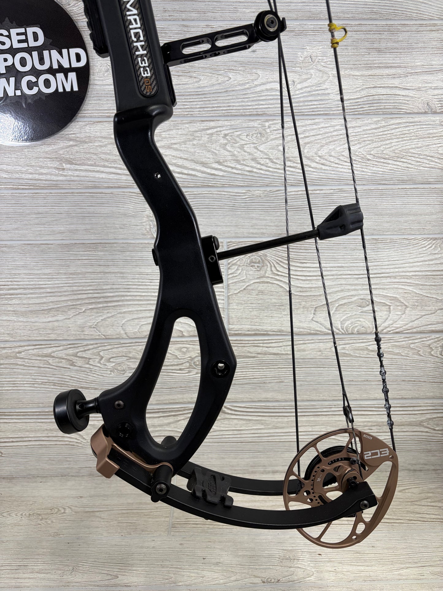 Used PSE Mach 33 DS 25.5-31" 70-80lb Right Hand Black/Bronze with Gas System X Strings