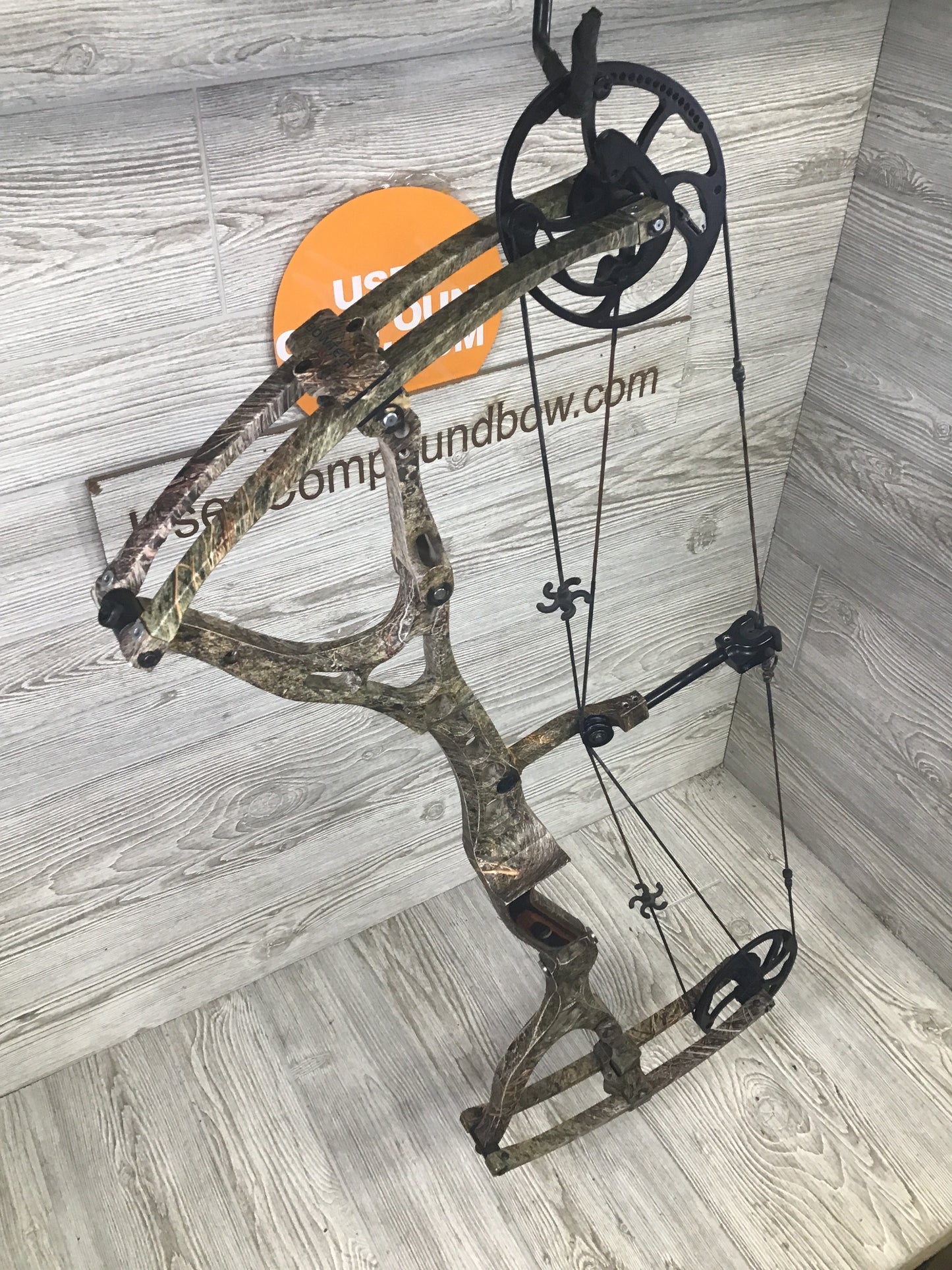 Used Bowtech General 60-70# Right Handed Mossy Oak brush