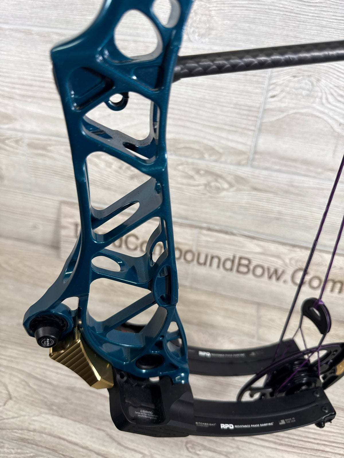 Used Mathews Title 38 (Gen 2) Teal Black Limbs custom purple strings RH
