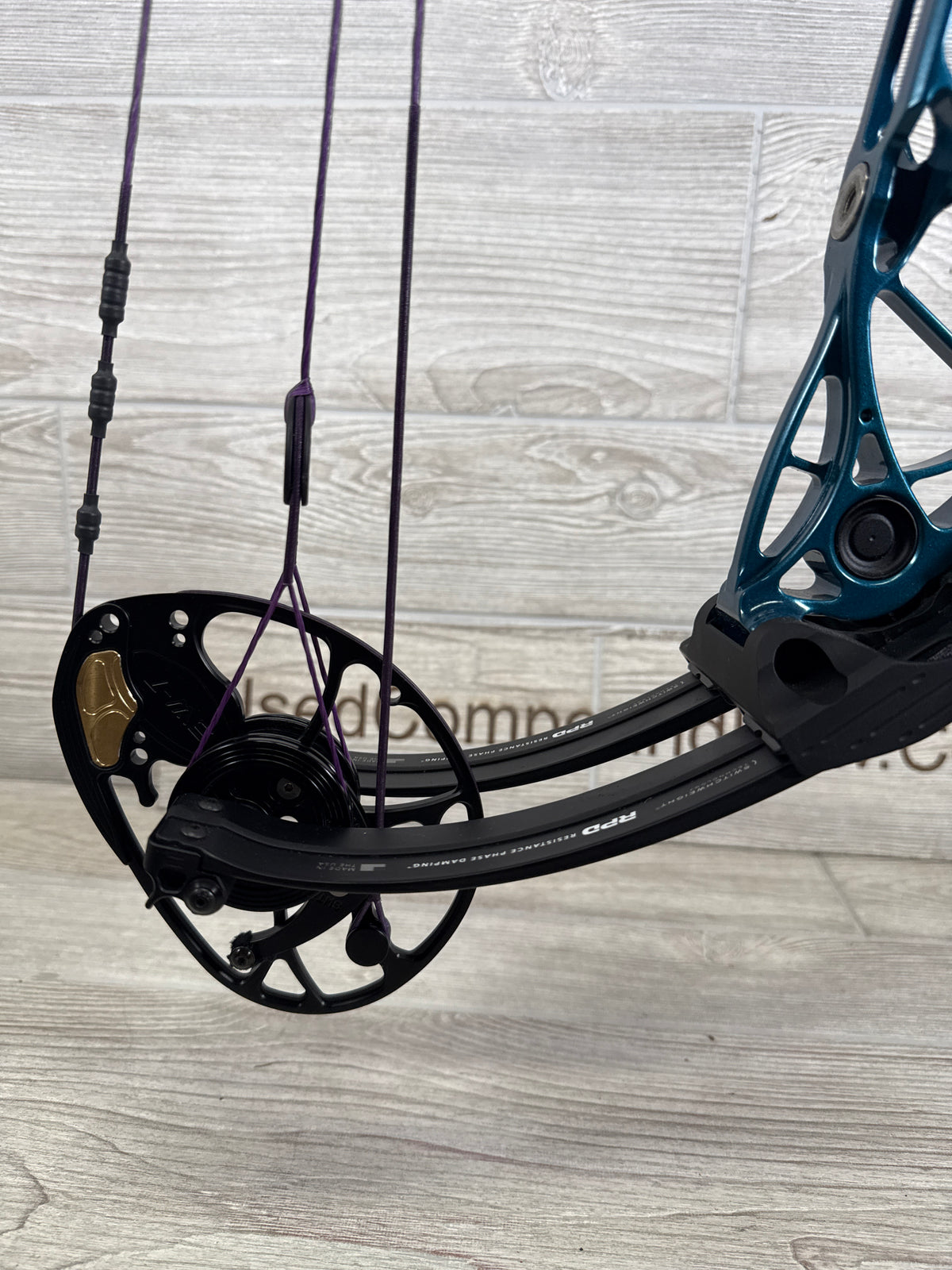 Used Mathews Title 38 (Gen 2) Teal Black Limbs custom purple strings RH