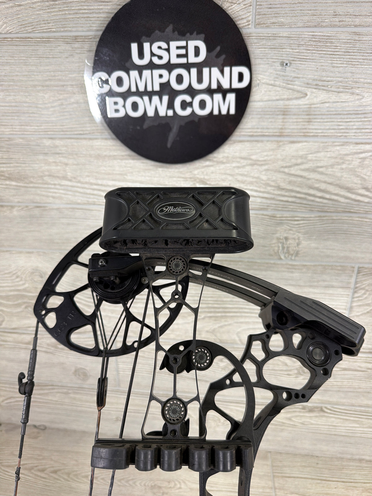 Used Mathews Triax 29.5" 70lb Black Bow Pkg