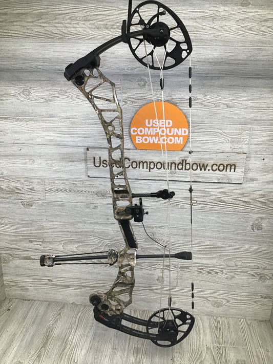 Used Mathews Traverse LH 60lbs Realtree dipped Package