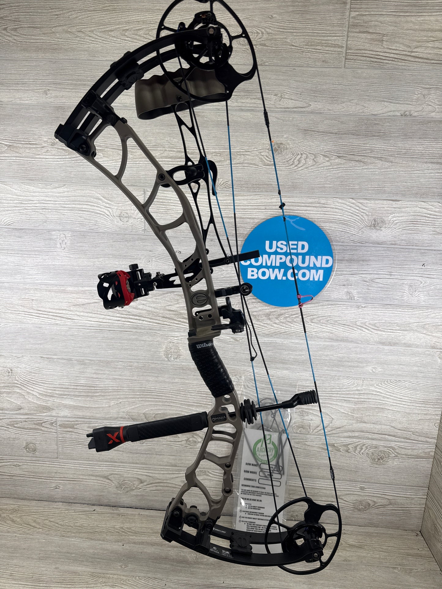 Used Elite Omnia Right Hand 70lb sienna, brown package