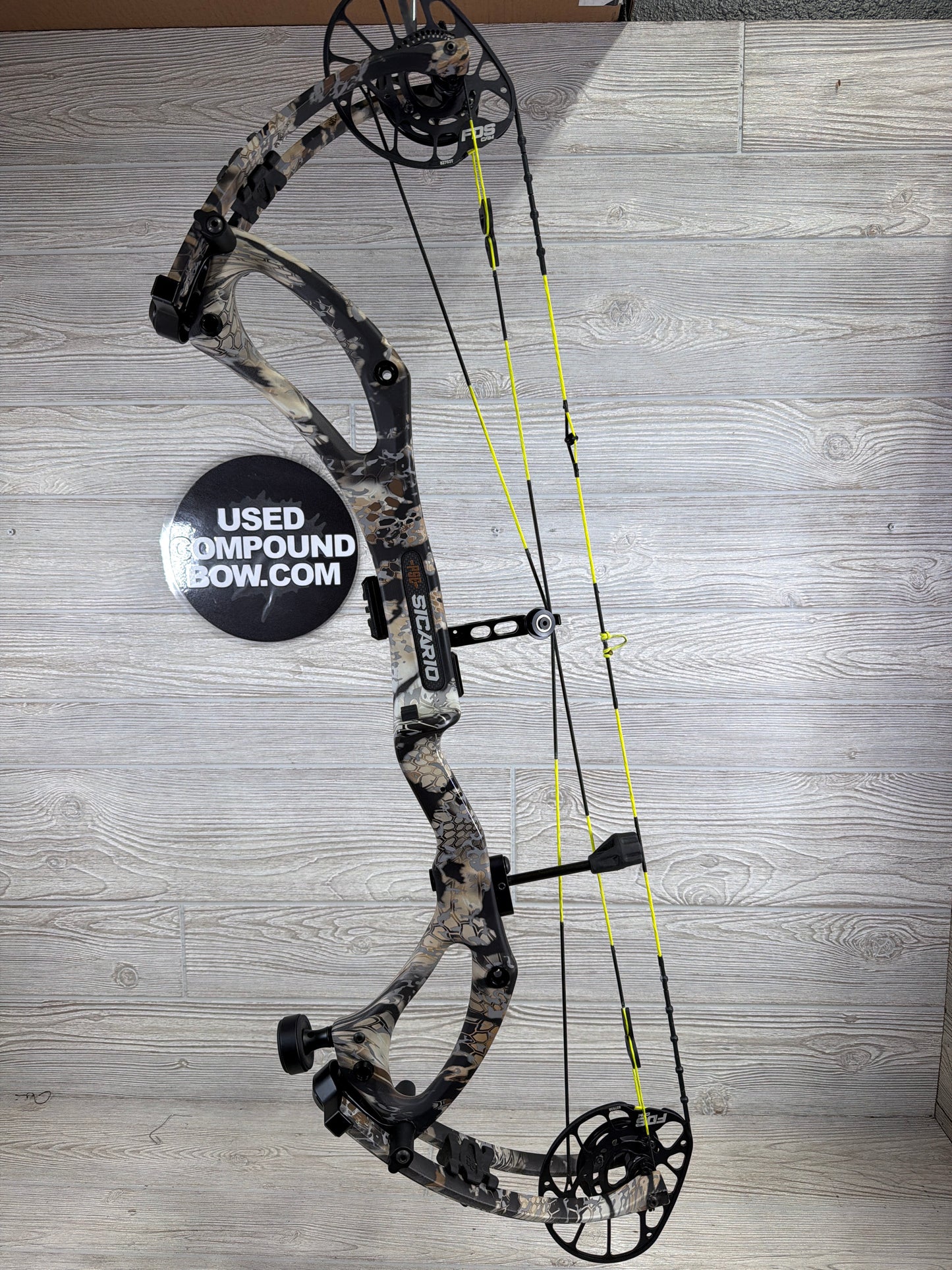 Used PSE Sicario FDS Kryptek Camo Right Handed with custom strings 80#