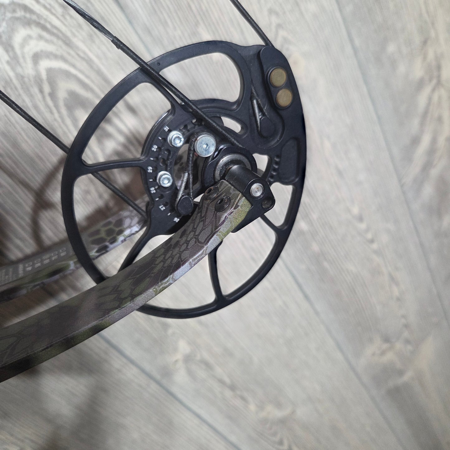 Used Bowtech Revolt X 28" 60lb RH Kryptek Camo Bow